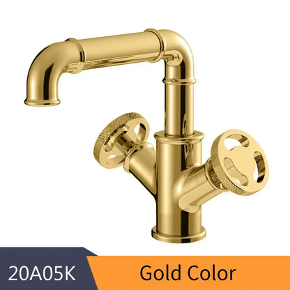 Gold-colored brass bathroom faucet with vintage industrial design and ornate wheel handles for decorbites black brass decor