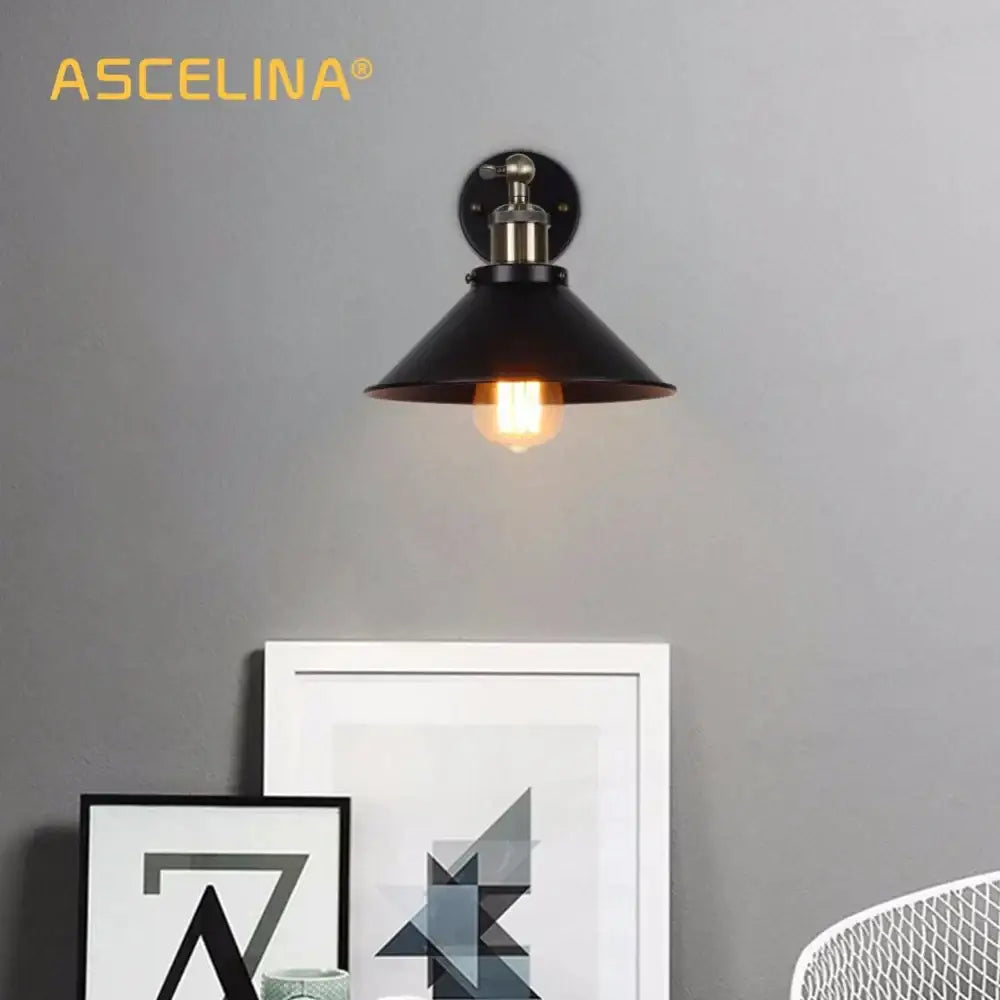 Industrial matte black and brass wall sconce with vintage edison bulb for living room lighting decorbites industrial wall