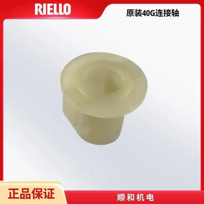 Translucent off-white plastic connector shaft by riello for industrial metallic burner oil pump brass and black kitchen accessory