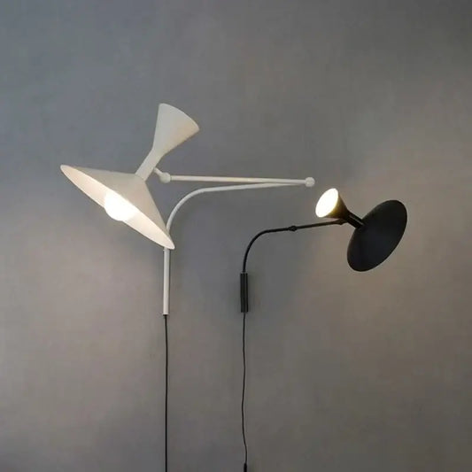 Modern industrial retro swing arm wall lamp with dual metallic arms and black and white shades for bedroom lighting