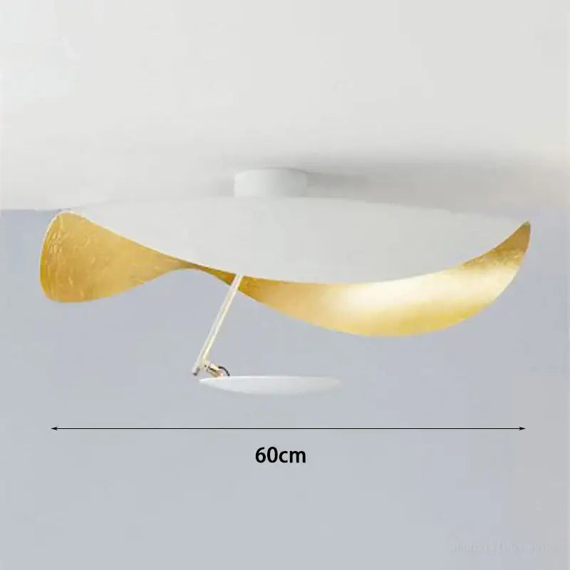 A modern industrial retro gold and black flying saucer hat ceiling lamp with sleek curved gold and white metallic surfaces