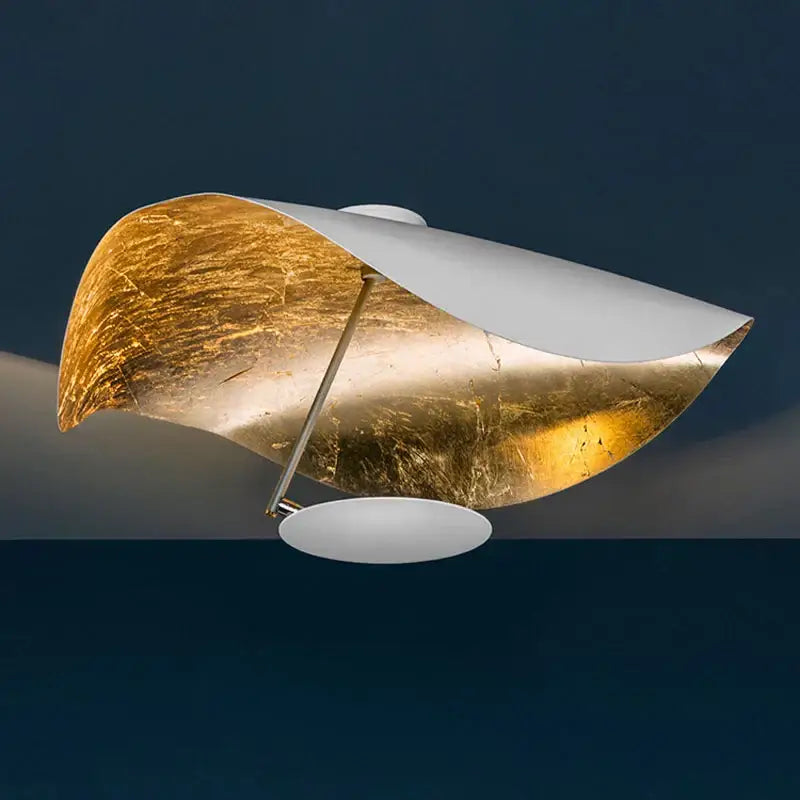 A modern decorbites flying saucer ceiling lamp with gold leaf and white matte surfaces for industrial retro bedroom decor