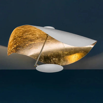 A modern decorbites flying saucer ceiling lamp with gold leaf and white matte surfaces for industrial retro bedroom decor