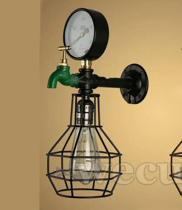 Industrial retro wall sconce with black metal cage, exposed filament bulb, green faucet, and pressure gauge for decorbites industrial retro decor