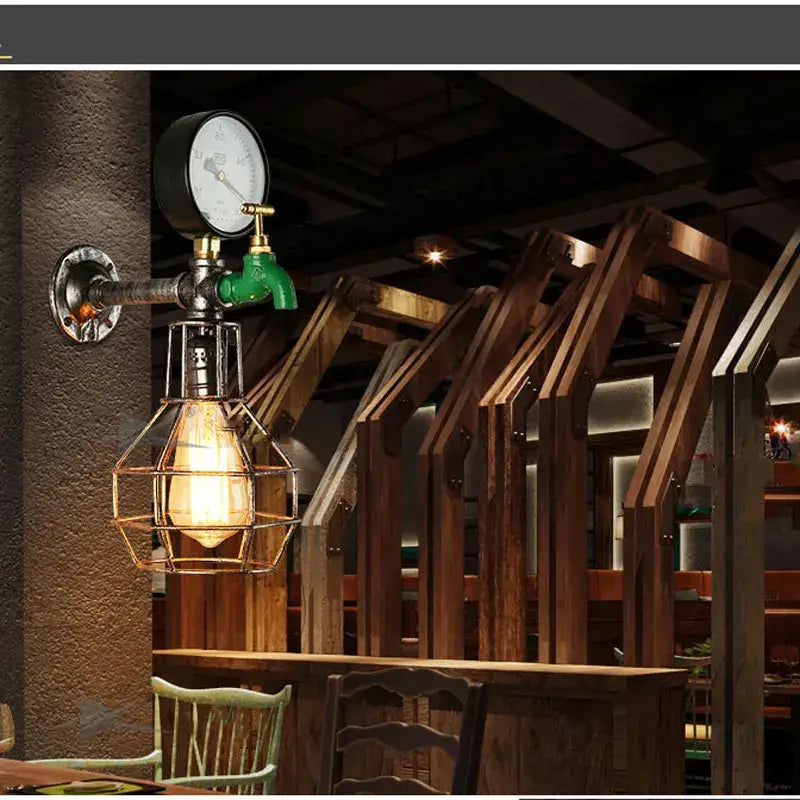 Industrial retro wall lamp with green faucet, brass fittings, and exposed edison bulb in metal cage for decorbites industrial retro style