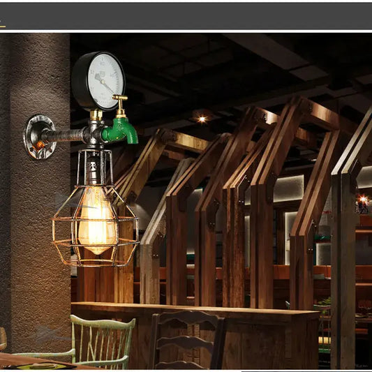 Industrial retro wall lamp with green faucet, brass fittings, and exposed edison bulb in metal cage for decorbites industrial retro style
