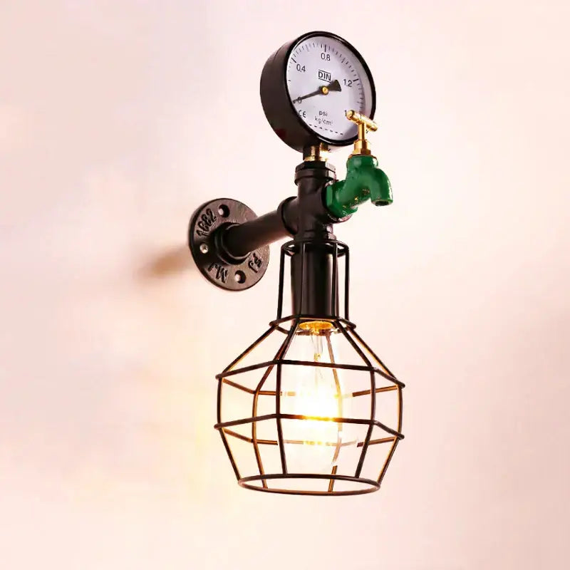 Industrial retro green faucet wall light featuring black metal pipe, pressure gauge, and exposed bulb in wire cage for decorbites industrial retro wall decor