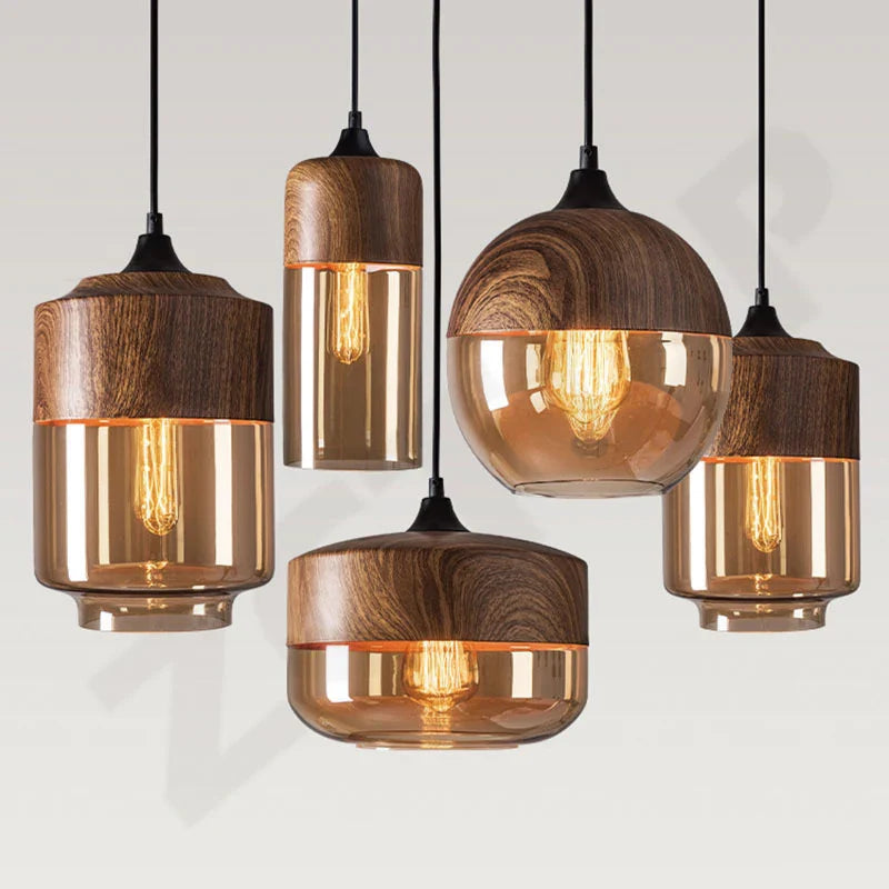 Warm-toned amber glass led pendant light with natural wood accents and exposed filament bulbs for dining room light source