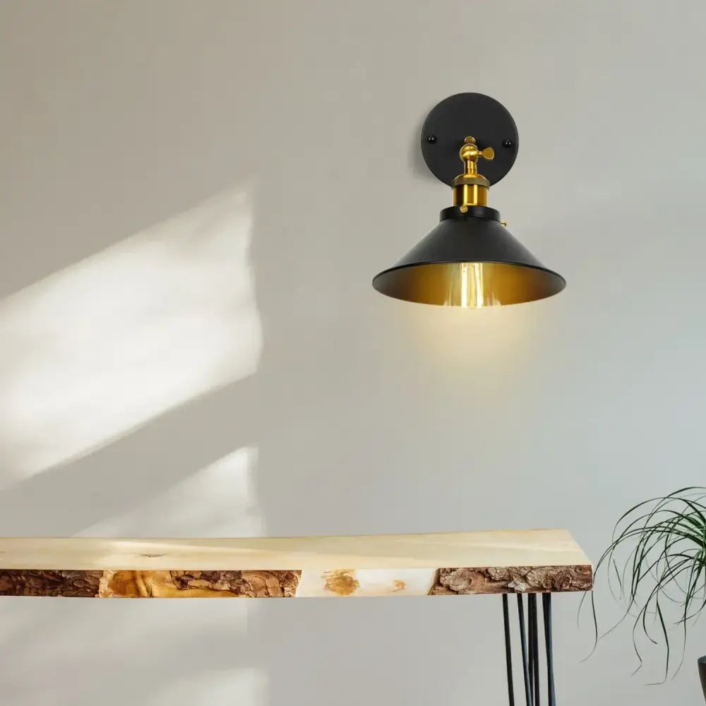 Black and brass industrial retro loft wall sconce with conical shade for decorbites industrial retro bedroom light