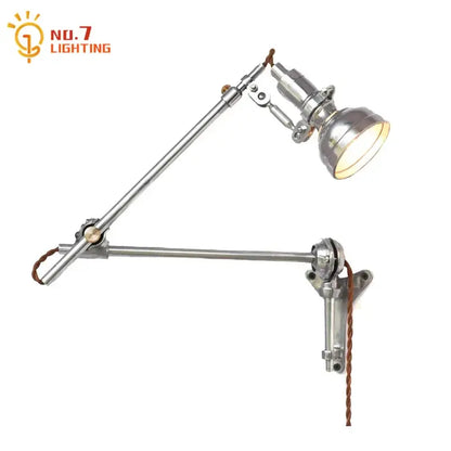 Industrial retro wall lamp with silver metallic finish, articulated arms, and brown braided cord for bedroom decorbites style