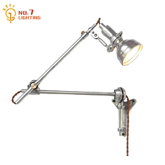 Industrial retro wall lamp with silver metallic finish, articulated arms, and brown braided cord for bedroom decorbites style