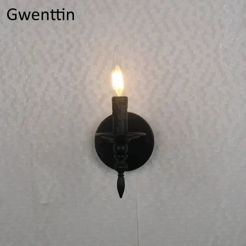 Black wrought iron industrial retro wall sconce with candle-style glowing bulb for decorbites industrial retro bedroom decor