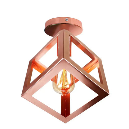 Copper-colored geometric ceiling light with visible filament bulb in industrial rose gold and brass finish for living room decorbites industrial ceiling light