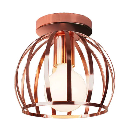 Copper-toned cage-style industrial ceiling light with frosted glass bulb for living room decorbites industrial ceiling decor
