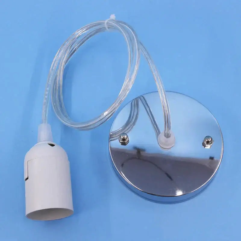 Chrome finished circular led pendant lamp with white plastic bulb holder and transparent cable for dining room light