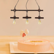 Decorbites™ industrial rust finish gear island pendant with three exposed filament bulbs in wrought iron for indoor use