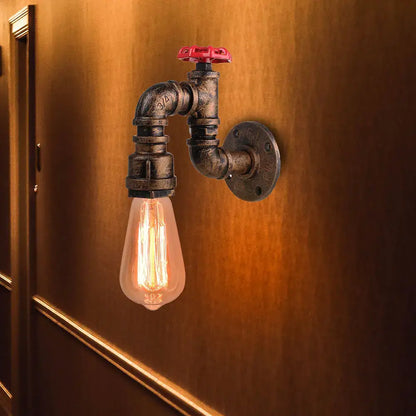 Industrial rusted iron water pipe wall lamp with rusted pipe design red valve handle and exposed edison bulb decorbites iron water
