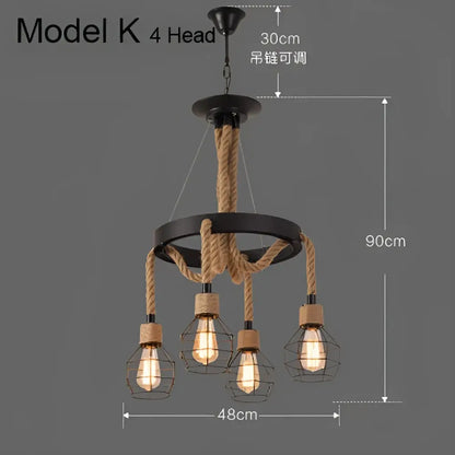 Industrial rustic pendant lights featuring black metal cage shades with four exposed edison bulbs and beige rope suspension