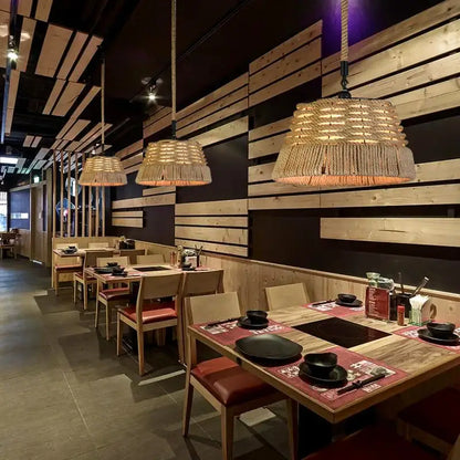 Woven rope pendant lights with warm amber glow in decorbites industrial rustic pendant wire cage design for dining room decor
