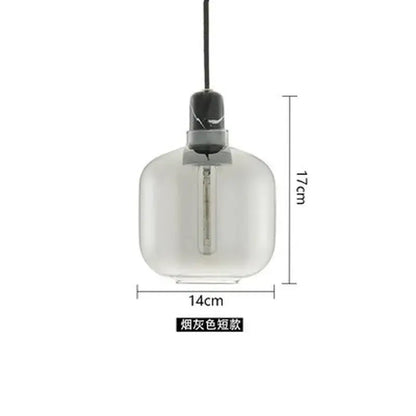 A sleek smoke-gray decorbites industrial stained glass pendant light with modern design and filament bulb for dining room