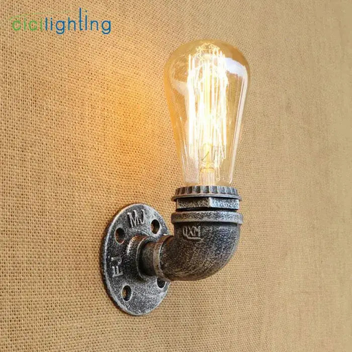 Industrial steampunk loft pipe wall lamp with vintage Edison bulb and black aged brass metal pipe fittings for decorbites