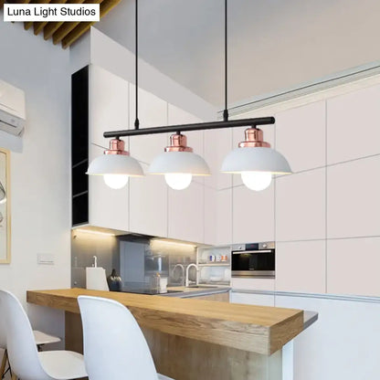 DecorBites™ industrial style three-light pendant fixture with black metal bar, rose gold accents, and white ceramic shades