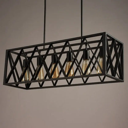 Black ironwork rectangular island light with geometric lattice design and five exposed edison bulbs in industrial style