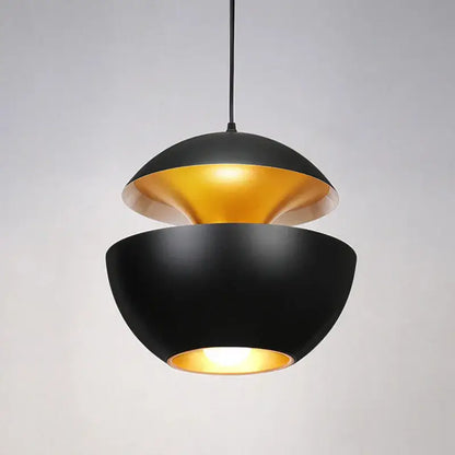 Industrial style led pendant light with black matte exterior and gold reflective interior split dome design for kitchen use