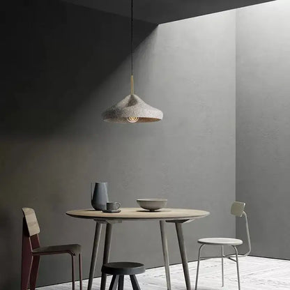 Industrial style pendant chandelier with textured gray concrete shade and brass-finished hanging rod for bedroom decorbites industrial style