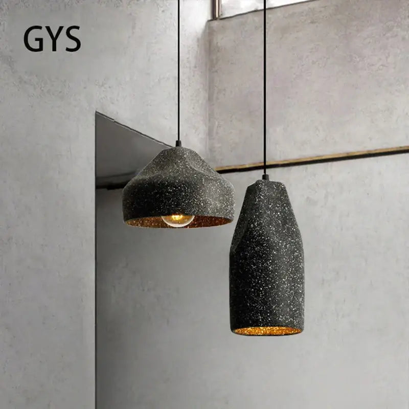 Two gys brand industrial style pendant chandelier with speckled black concrete exterior and gold-lined interior lighting decorbites industrial style