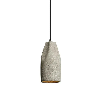 Concrete pendant chandelier with textured gray exterior and warm brass interior for decorbites industrial style bedroom light