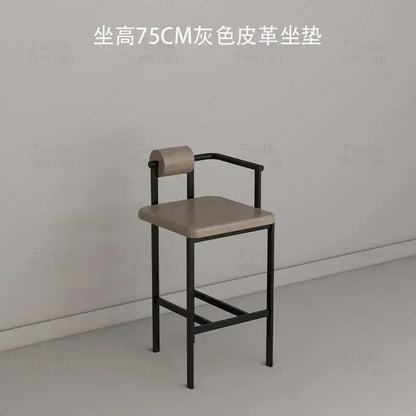 A modern industrial style bar chair with sleek black metal frame and gray leather seat for decorbites industrial style use
