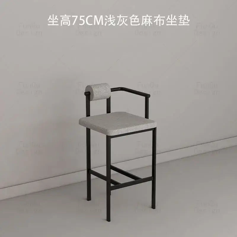 A modern industrial style bar chair with black metal frame and light gray hemp fabric upholstery by decorbites