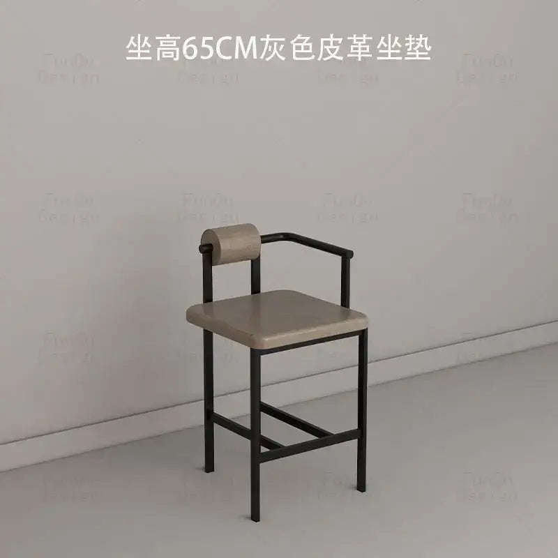 Minimalist black metal-framed bar chair with gray leather seat for decorbites industrial style bar and dining room use