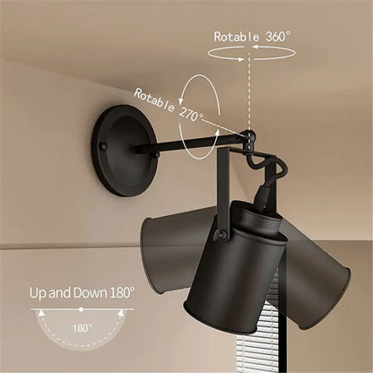 Black matte adjustable wall-mounted spotlight fixture with three cylindrical heads for industrial vintage black ceiling lights decorbites
