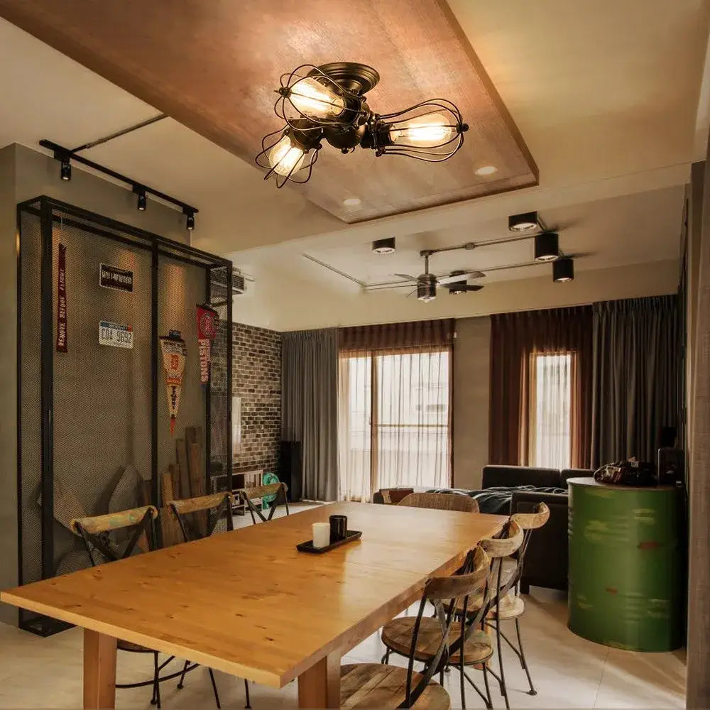 Industrial vintage black metal cage ceiling light with exposed filament bulbs for dining room decorbites industrial vintage