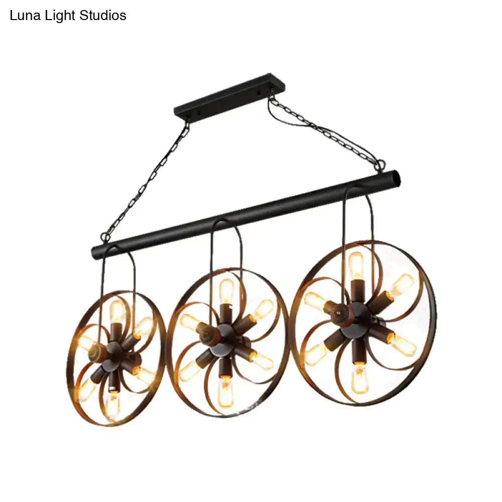 DecorBites vintage black metal island light with three circular fan-like fixtures ideal for dining room use