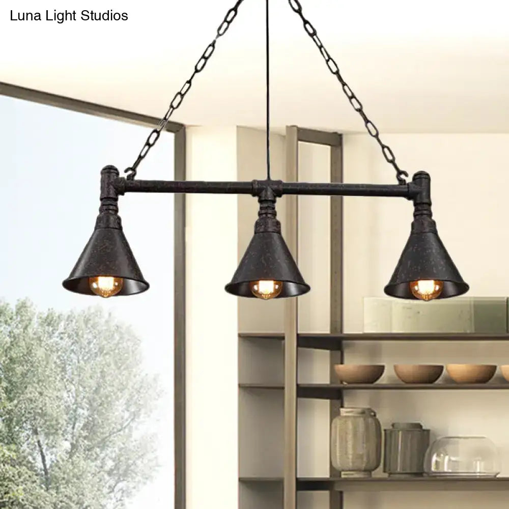 Industrial-style black metal chandelier with three conical shades and chain suspension for island lighting and dining rooms