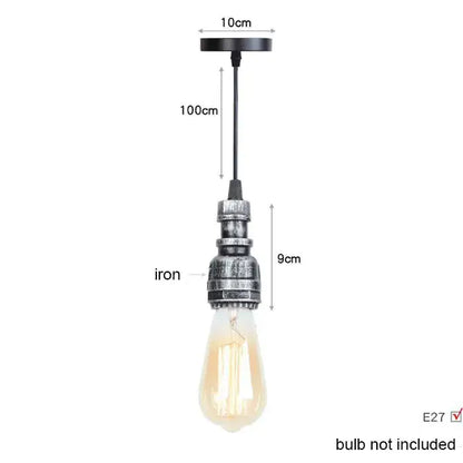 Industrial vintage brass and black pipe pendant light fixture with black iron and exposed edison bulb for kitchen use