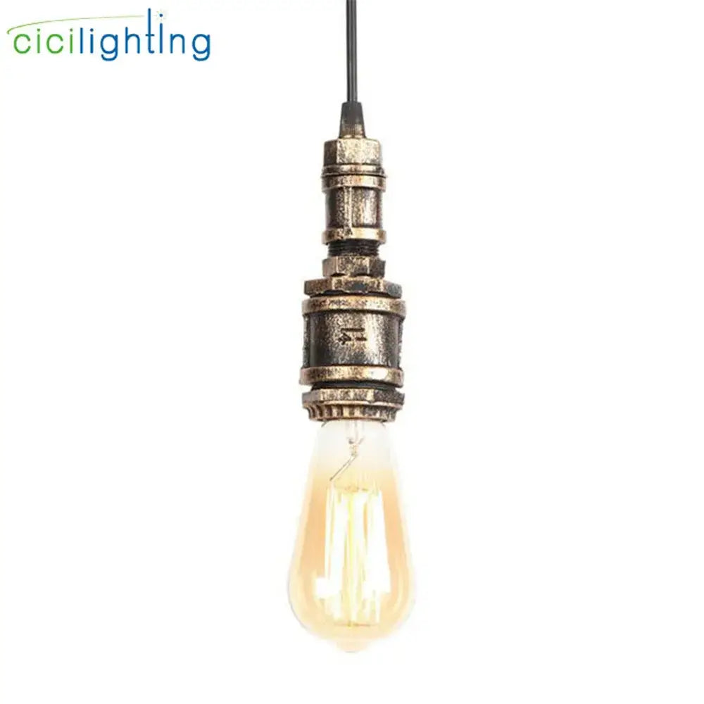 Industrial vintage brass and black pipe pendant light fixture with amber glass bulb for kitchen use