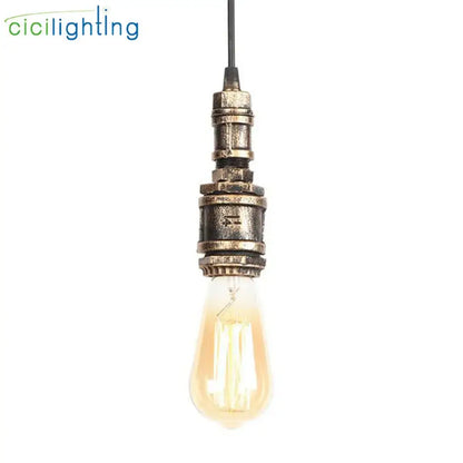 Industrial vintage brass and black pipe pendant light fixture with amber glass bulb for kitchen use