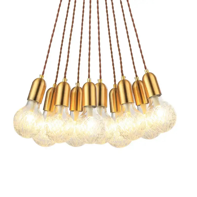 A modern decorbites industrial vintage pendant light set of 2 featuring textured glass bulbs and brass caps for dining rooms