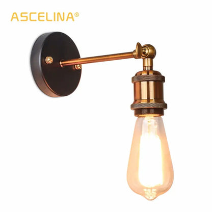 Brass-finished industrial vintage wall sconce with black backplate and exposed edison bulb for decorbites industrial vintage decor