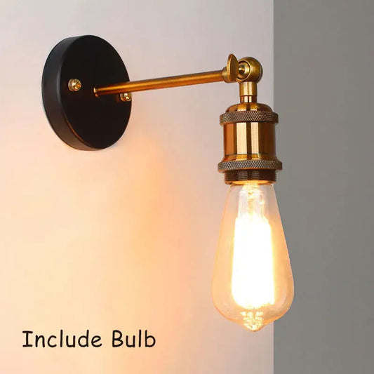 Industrial vintage brass wall sconce with a brass-finished arm and exposed Edison bulb for bedroom decorbites industrial vintage lighting