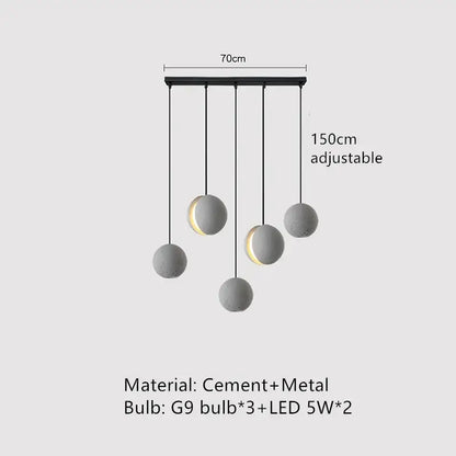 Modern minimalist pendant lamp with five matte gray cement spheres and led and g9 bulbs by decorbites industrial vintage