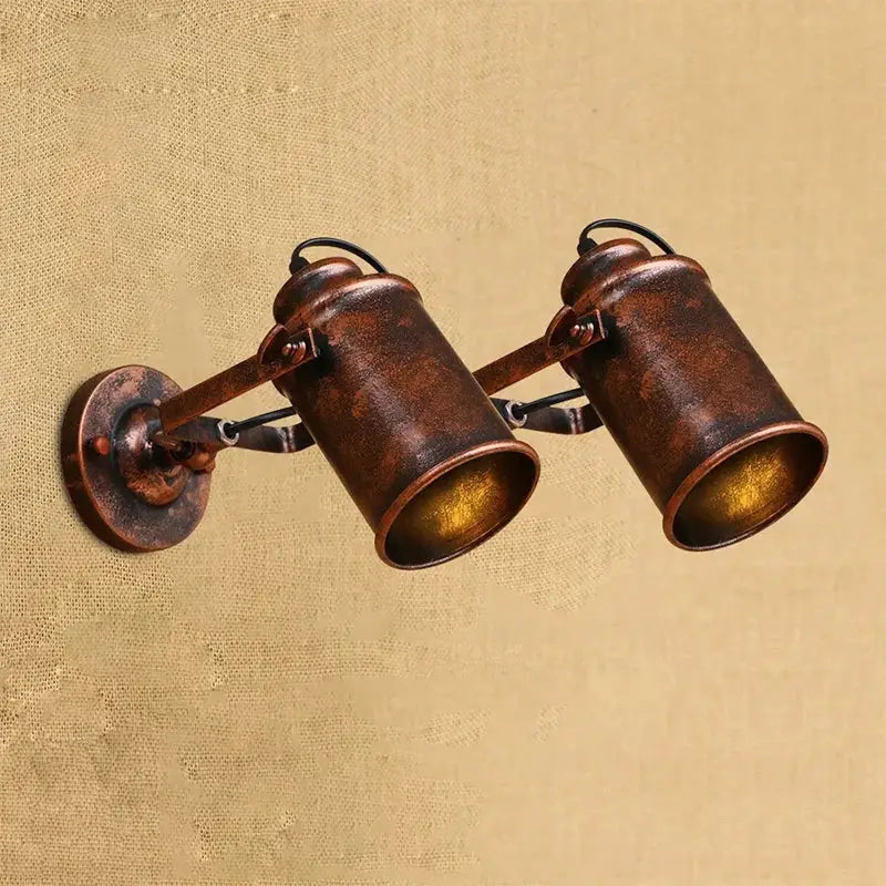 Vintage-style copper finish industrial wall lamp with two adjustable spotlight arms decorbites wall lamp design
