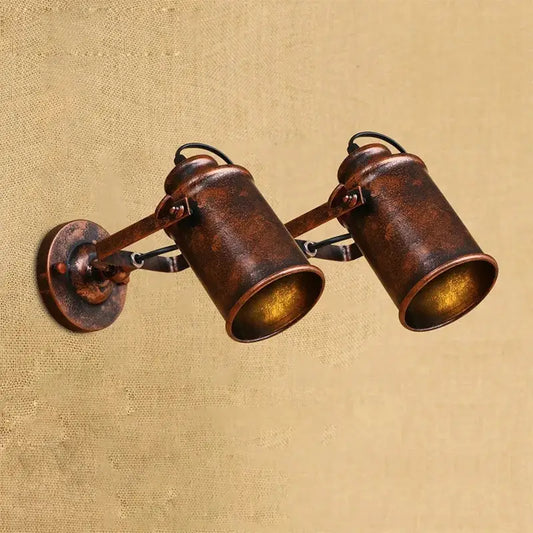 Vintage-style copper finish industrial wall lamp with two adjustable spotlight arms decorbites wall lamp design