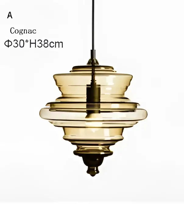 Cognac-colored industrial vintage glass pendant lamp with tiered rings and brass fixture for dining room decorbites industrial vintage