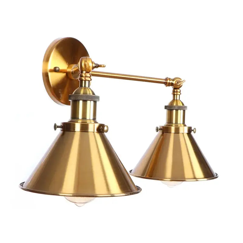 Brass double-arm wall light with conical shades in decorbites industrial vintage style for bedroom lighting
