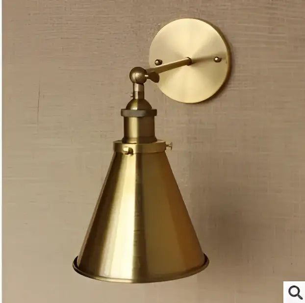 Brass-finished industrial vintage wall lamp with conical shade and adjustable arm for decorbites industrial vintage decor